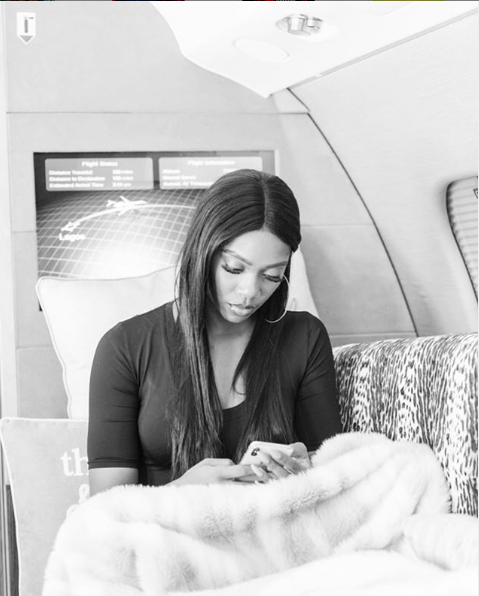 Nigerian Singer, Tiwa Savage Poses In A Private Jet