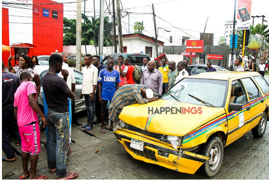 Taxi Driver Breaks Down In Tears After His Car Was Hit By A Lady In Lagos ( Photos )