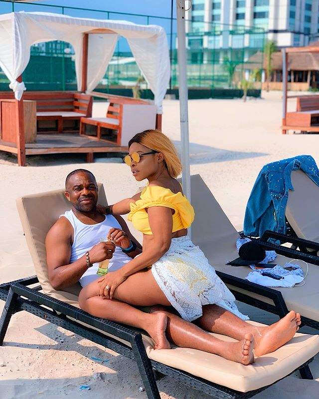 Linda Ikeji's Sister Wows In Bikini As She Sits On Her Husband (Photos)