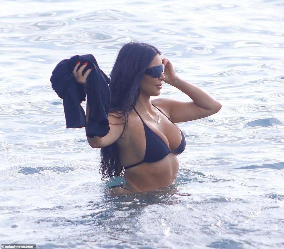Kim Kardashian Showcases Her Killer Curves In Tiny Bikini (Photos)
