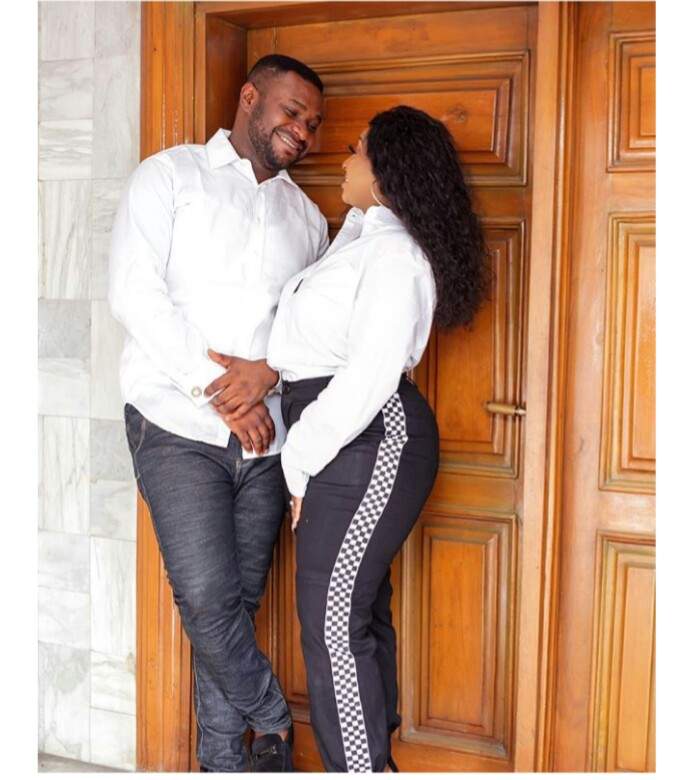 Endowed Lady Wears Cleavage-Baring Outfit In Pre-Wedding Photos With Her Fiance
