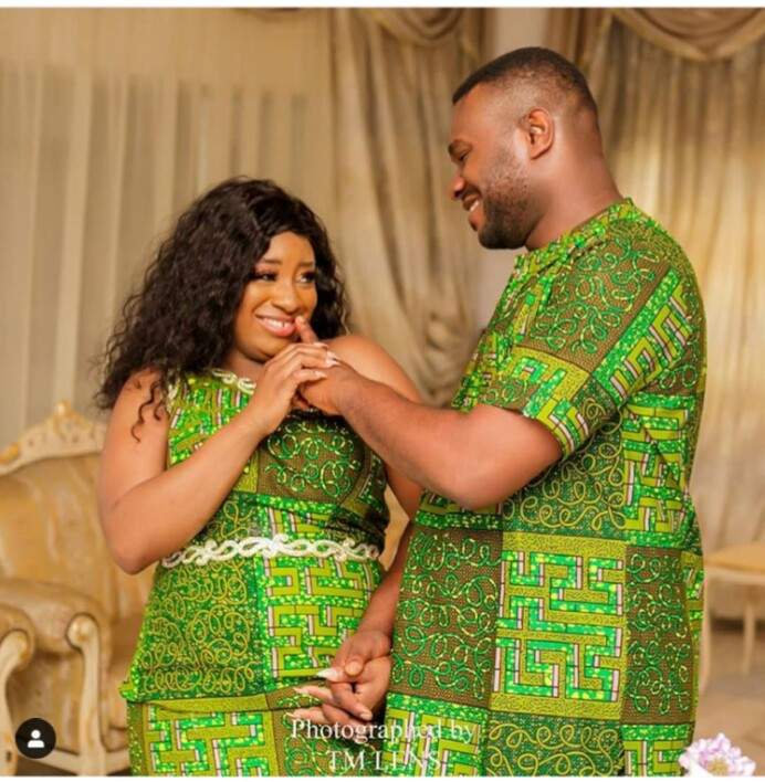 Endowed Lady Wears Cleavage-Baring Outfit In Pre-Wedding Photos With Her Fiance