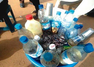 Father and Son Land in Serious Trouble For Allegedly Manufacturing Local Gin in Asaba