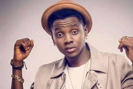 How Kiss Daniel Earned Monthly Salary Of 30k, Missed Father's Burial And Got Blocked By Basketmouth On Instagram