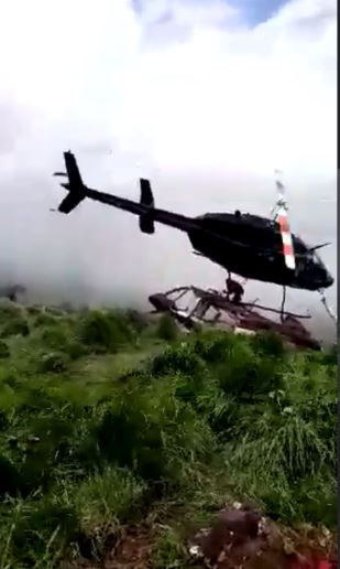 The rescue chopper can be seen tipping to the side