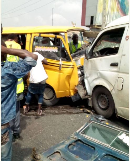 Reckless Danfo Driver Collides With A Toyota Hiace Bus On Otedola Bridge (Photos)