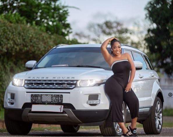 Curvy Ghanaian Actress, Moesha Boduong Flaunts Her New Range Rover SUV