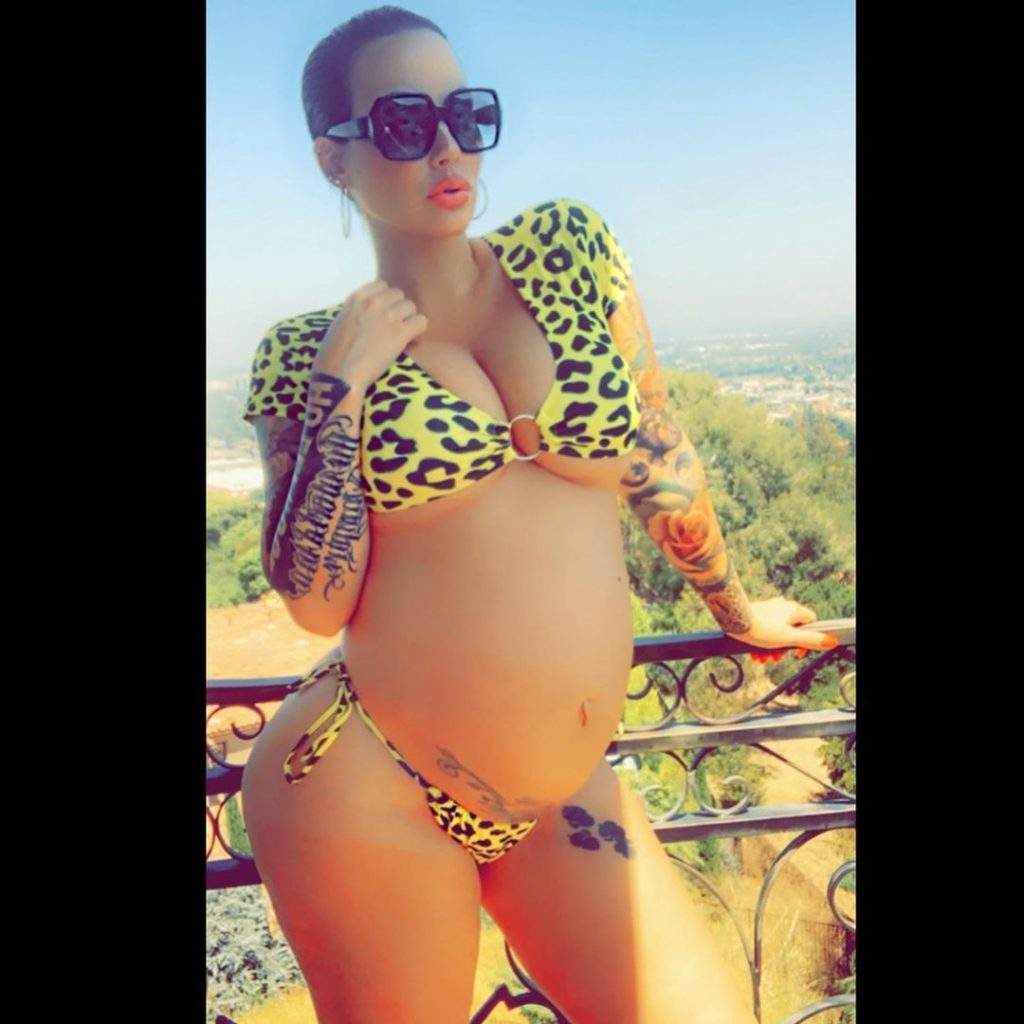 Amber Rose shows off her bare bump at 9-months pregnancy