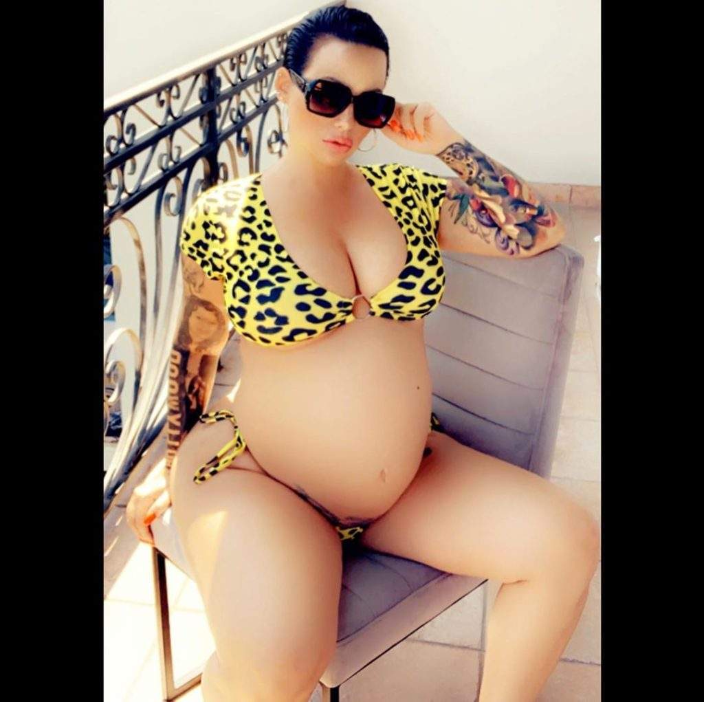 Amber Rose shows off her bare bump at 9-months pregnancy