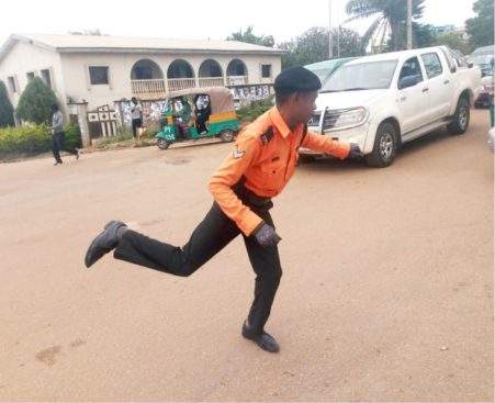 Meet 'Yellow', The Most Vibrant Traffic Warden In The City Of Jos