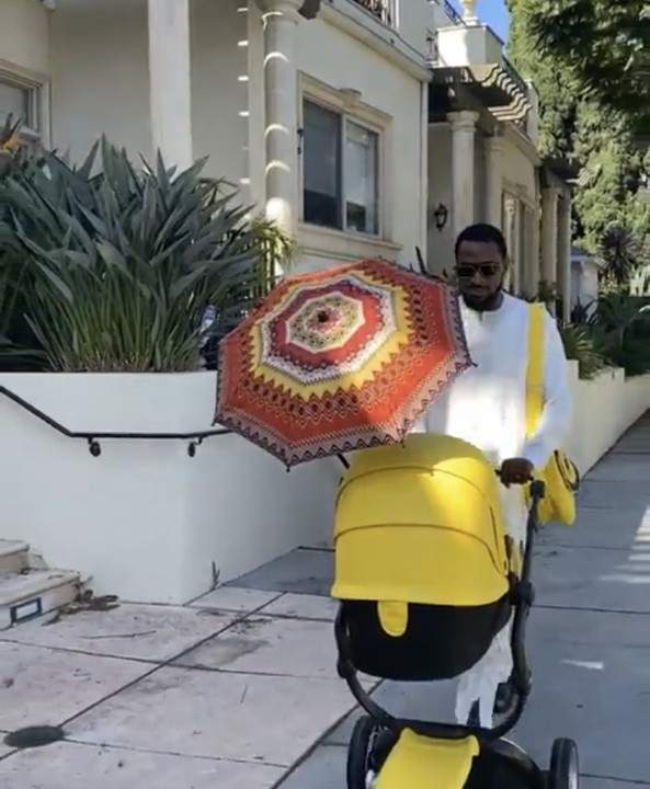 DBanj steps out with his son