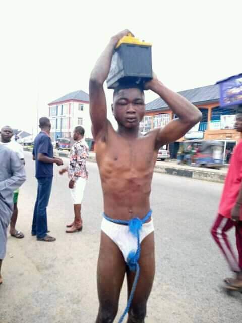 Young man gets stripped and brutally whipped for stealing solar light battery in Bayelsa community (Photos)