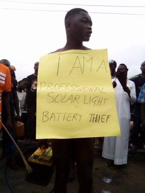Young man gets stripped and brutally whipped for stealing solar light battery in Bayelsa community (Photos)