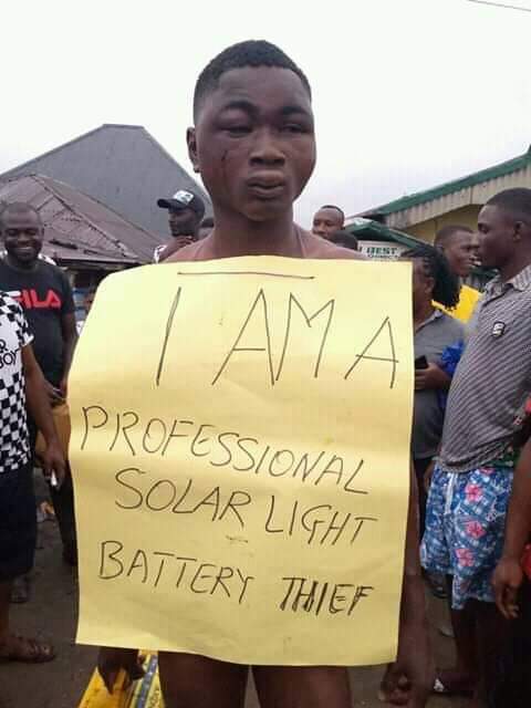 Young man gets stripped and brutally whipped for stealing solar light battery in Bayelsa community (Photos)