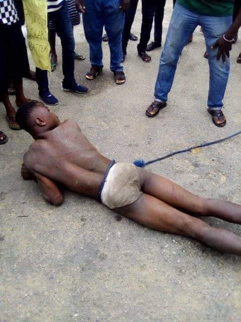 Young man gets stripped and brutally whipped for stealing solar light battery in Bayelsa community (Photos)