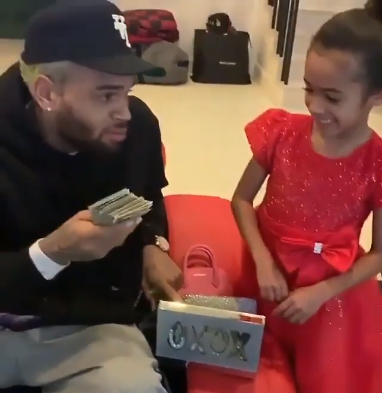 Chris Brown Gifted His Daughter, A Stack Of Cash & Balenciaga Gears For Christmas