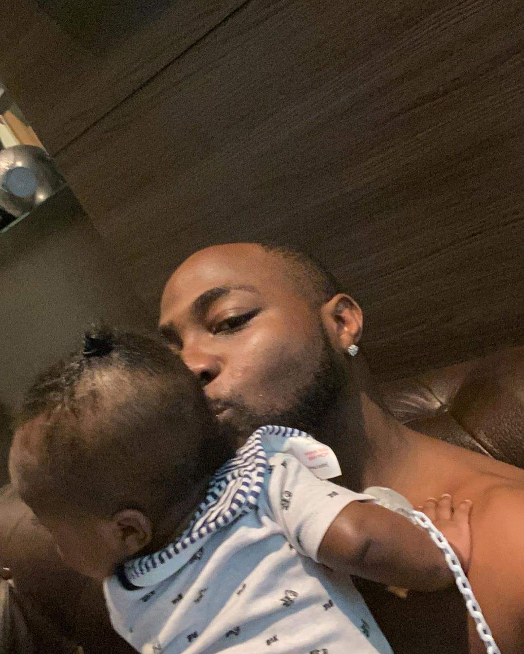 'Staying strong for mama' - Davido writes as he shares photo with his son