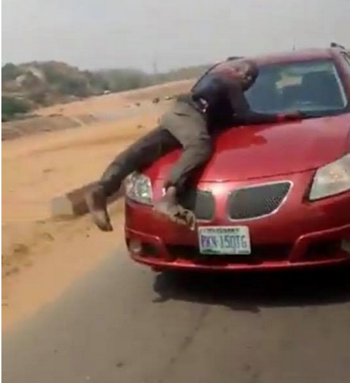 FRSC reacts to viral video of lady who was almost assaulted by one of its officials for speeding off with policeman on her car's bonnet