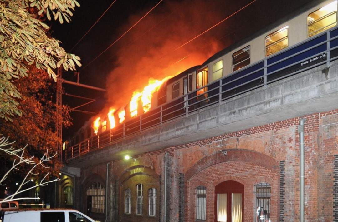 Train carrying football fans catches fire (Photos)