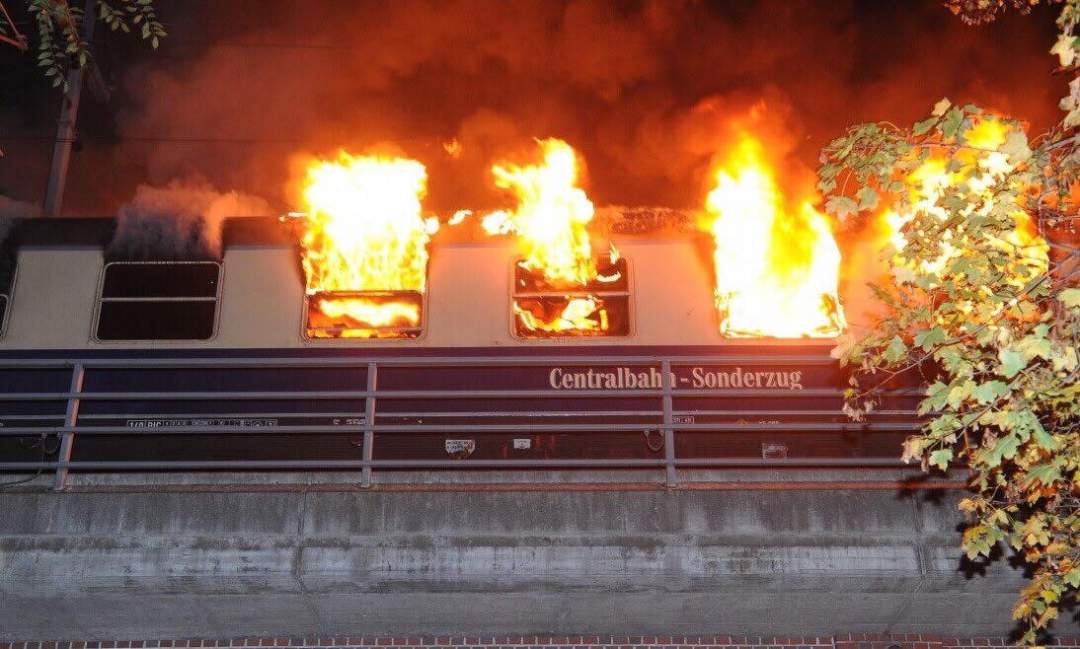 Train carrying football fans catches fire (Photos)