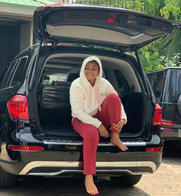 Check Out 10 Stunning Photos Of Regina Daniels Posing With Supercars