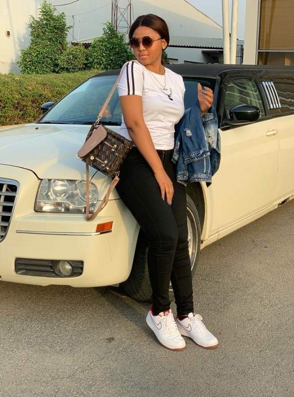 Check Out 10 Stunning Photos Of Regina Daniels Posing With Supercars