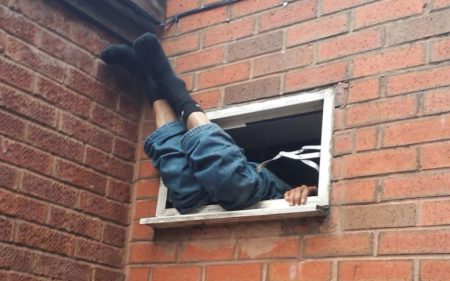 'Please Help Me' - Burglar Rescued By Police After Getting Stuck In A Window For Five Hours