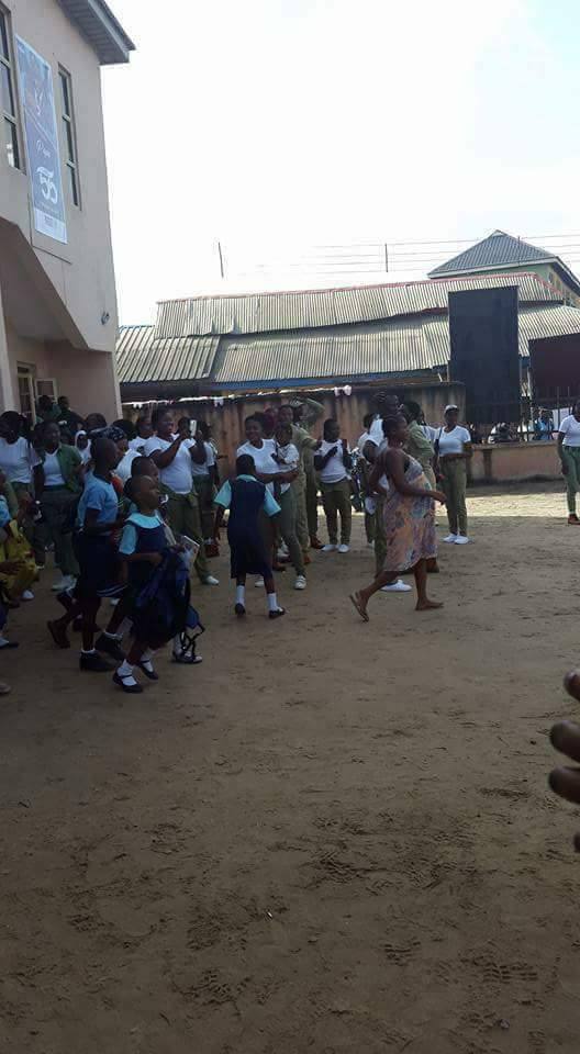 See Photos Of Children Jumping Over School Fence To Escape Vaccination By Soldiers In Rivers State.