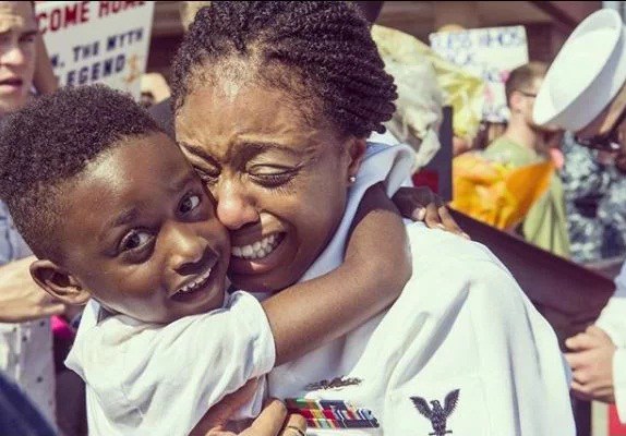 Checkout The Emotional Moment Nigerian Mum In U.S Navy Reunites With Her Son After 7 Months On Sea