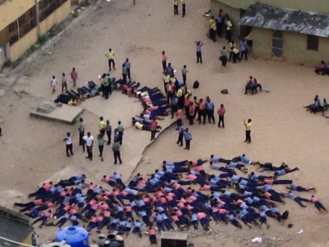 See Photo Of Kings College, Lagos Students Being Punished Like Animals.