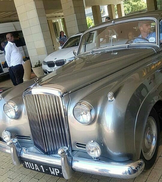 Banky W and groomsmen tease the internet with their shoe & wrist, as Adesua arrives in Classic Vintage Rolls Royce