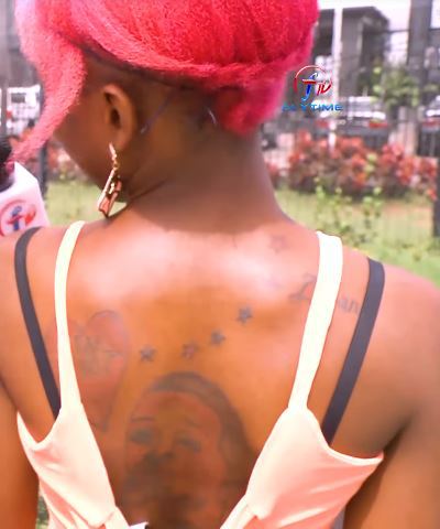 Face of die-hard Wizkid's fan who tattooed his face on her back revealed! - Wizkid is looking for her. (photos + video)