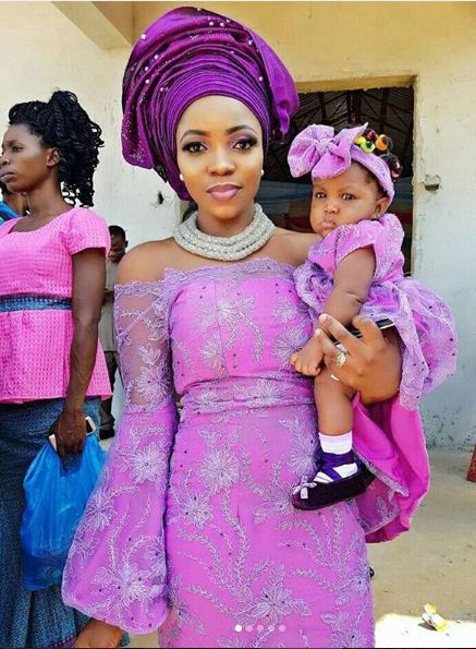 Female NYSC Member Melt Hearts Online as She Poses with Her Little Daughter in Matching Uniforms (Photos)