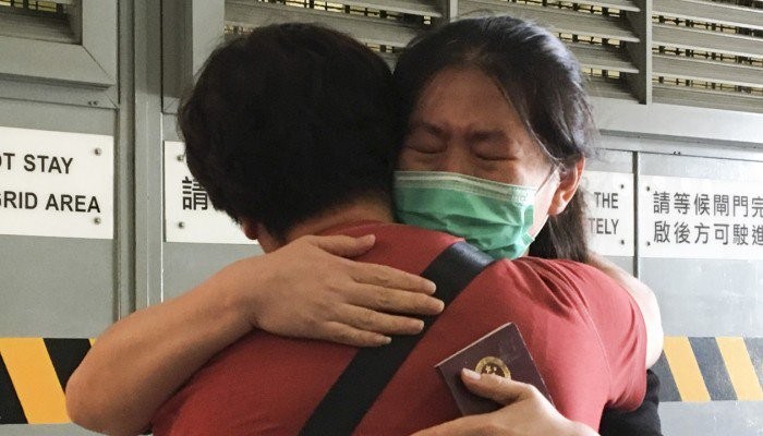 Tears of joy as Chinese woman tricked by Nigerian boyfriend into carrying drugs is found not guilty after three years in jail (Photos)