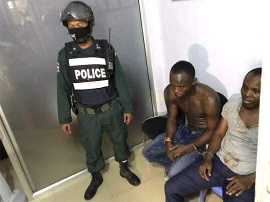 Two Nigerian men arrested in Cambodia for fighting on the street (Photos)