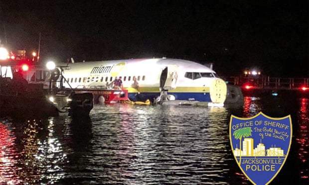 Plane skids off runway, falls into river in Florida