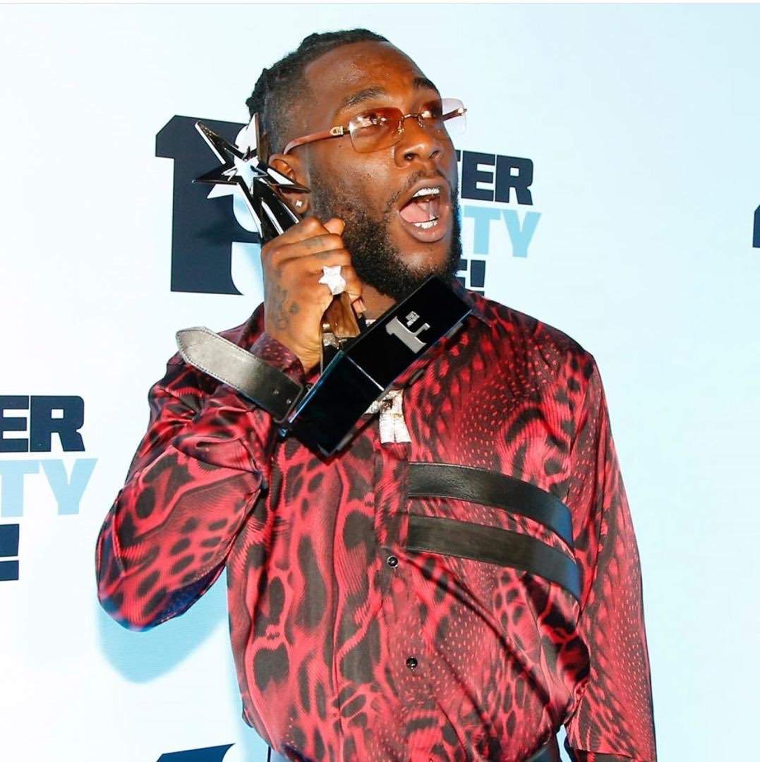 Funny enough I went to get a drink - Burna Boy on why his mum received the award on his behalf