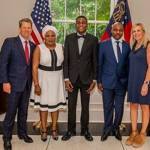 MC Oluomo and family strike a pose with Governor of Georgia, USA (photos)