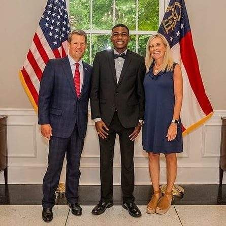MC Oluomo and family strike a pose with Governor of Georgia, USA (photos)