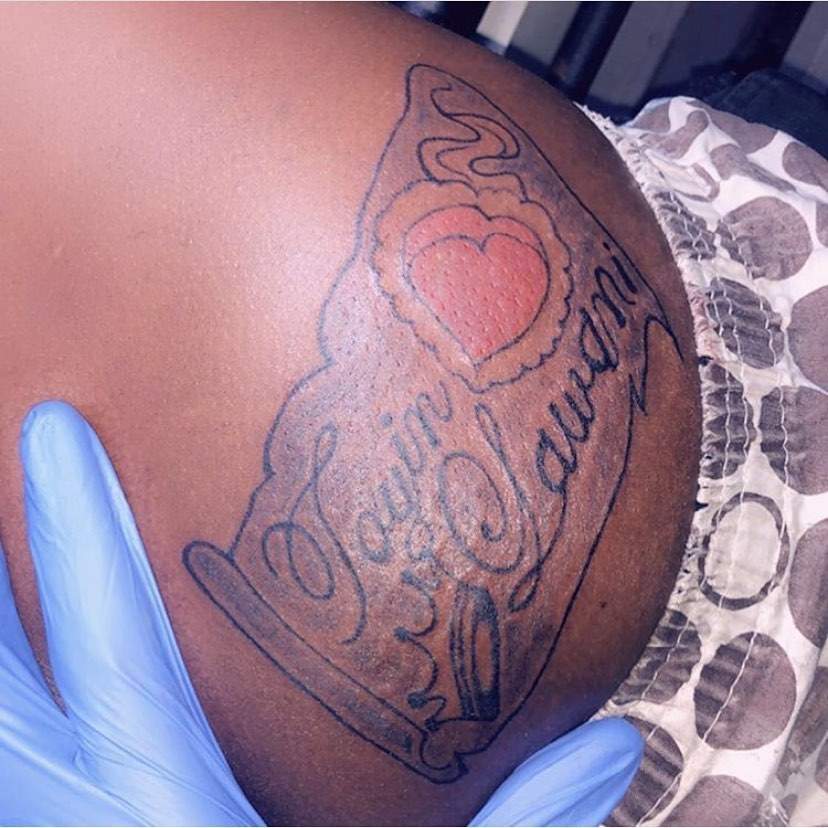 Toyin Lawani's staff, JP Blush gets huge tattoo of her name on his butt (photo)