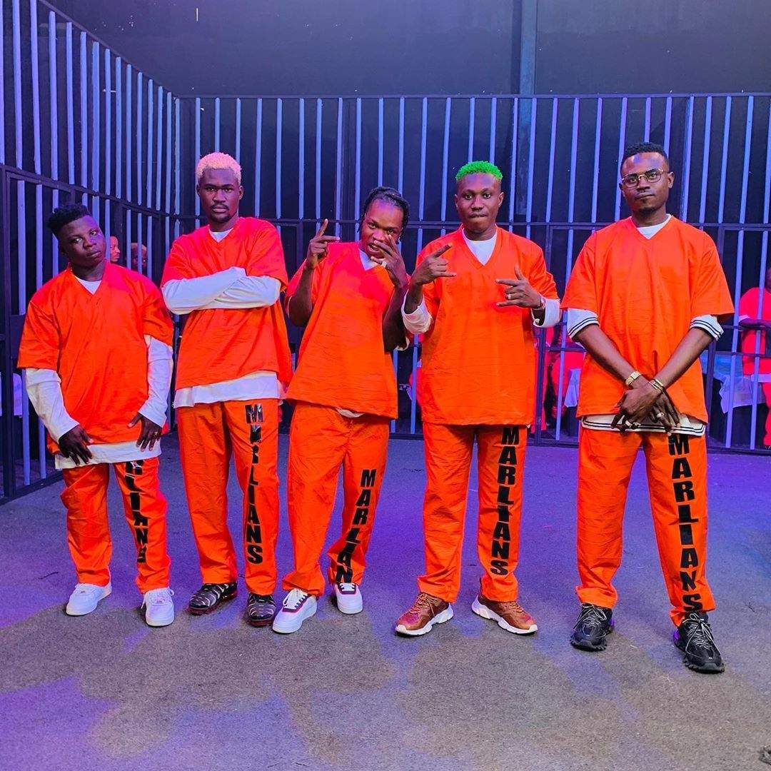 Naira Marley Recreates EFCC Mugshot With Crew