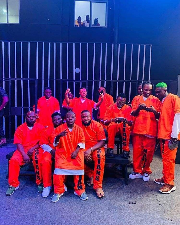 Naira Marley Recreates EFCC Mugshot With Crew