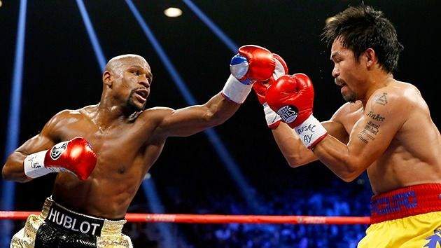 Manny Pacquiao tells Floyd Mayweather to come out of retirement for a rematch after beating Adrien Broner