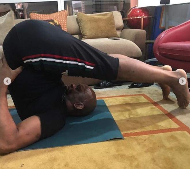 Billionaire Tony Elumelu, shows off his flexibility during Yoga session (Photos)