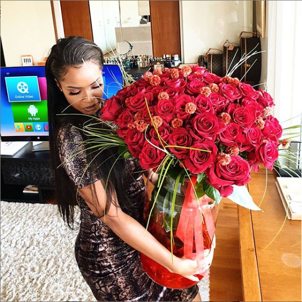 Emmanuel Adebayor surprises his girlfriend Dillish Mathews with giant bouquet of red roses on Valentine's Day (Photo)