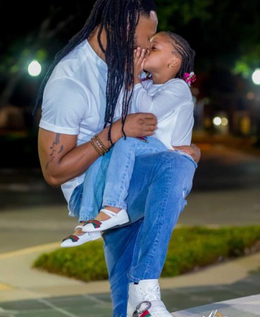 'I love You So So Much My Twin' - Flavour Says As He Shares Adorable Photo Kissing His Daughter