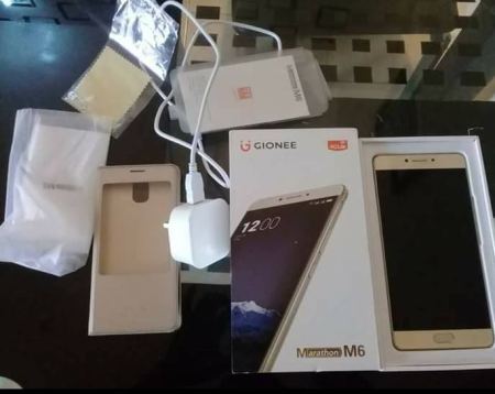 Photos: Rivers Lawmaker Representing Ahoada West, Buys 85 Pieces Of Gionee 5 Phones As Constituency Project (Photos)