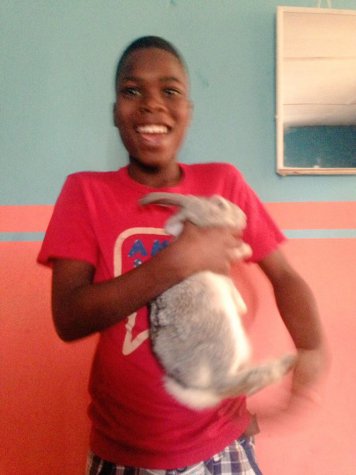 12-year-old Nigerian Boy Raised 2 Rabbits And Nurtured Them Into 26, Plans To Expand The Rabbit Business (Photos)