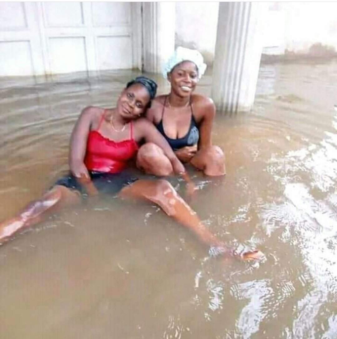 Nigerian Ladies use Flooded Areas as Swimming Pool