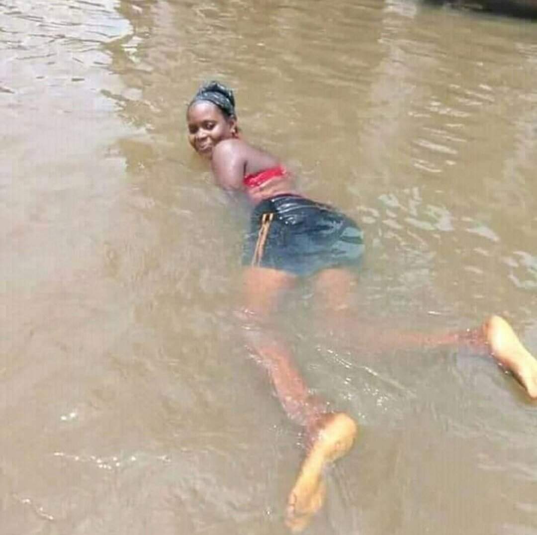 Nigerian Ladies use Flooded Areas as Swimming Pool